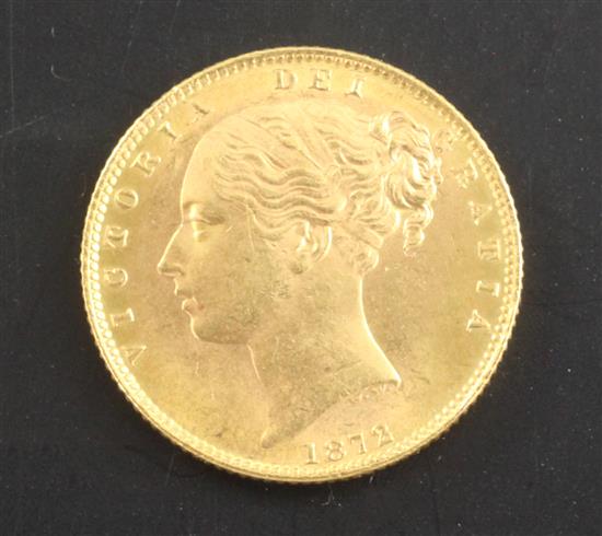 An 1872 Victoria gold sovereign, near UNC.